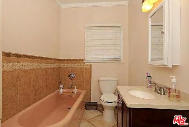 Representative remodeled bathroom. Photograph courtesy of the MLS 2015.