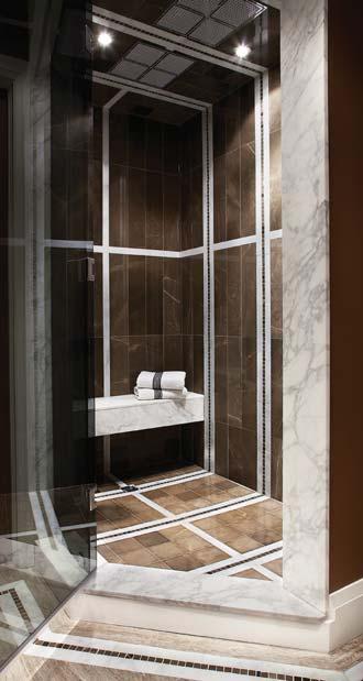 The shower remains clutter free due to built in marble shelving and matching marble bench. Each rain-head is serviced with a separate 2 water main, ensuring commercial grade pressure and flow.