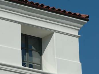 Window head heights: may vary Stucco with handmade/formed appearance; skip-trowel