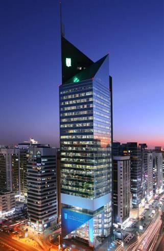National Bank of Abu Dhabi ABU DHABI, UNITED ARAB EMIRATES This slim skyscraper is the flagship headquarters for the National Bank of Abu Dhabi and features an inverted prism extending from the