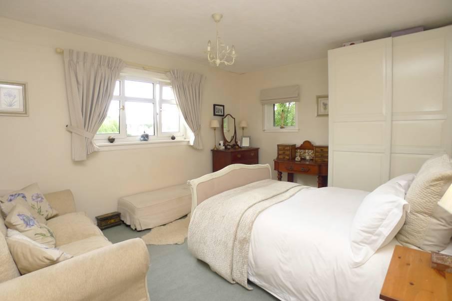 The beautifully presented accommodation comprises on the ground floor; entrance vestibule, hall, attractive staircase, bay window drawing room overlooking the mature garden.