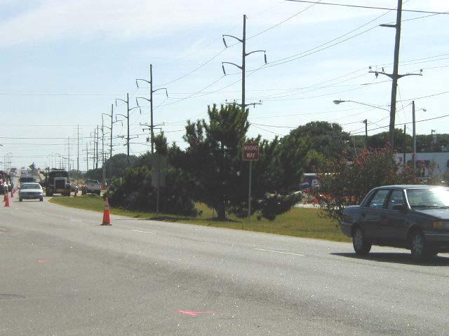 The zone is also negatively impacted by the tall towers for high-voltage power lines that are visible along the southern side of the roadway.