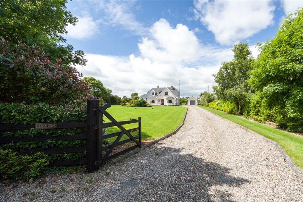'Aisling' is an impressive detached family residence set within mature landscaped gardens in an attractive rural setting.