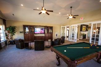 This private Clubhouse offers a heated pool, fully equipped fitness center and