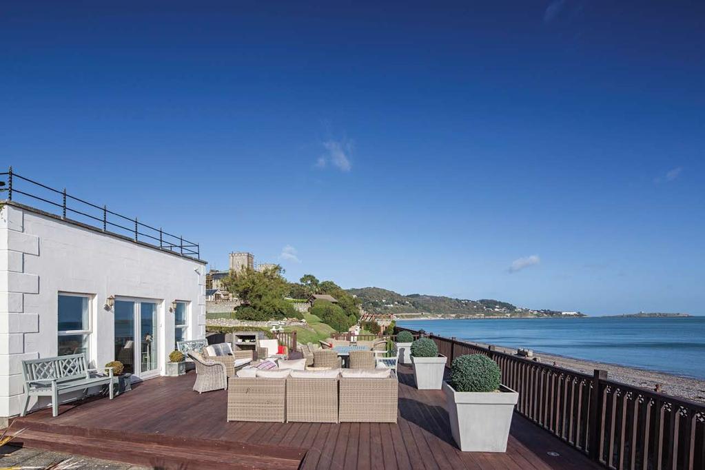 Stunning castellated seafront home with unparalleled views of Killiney Bay.