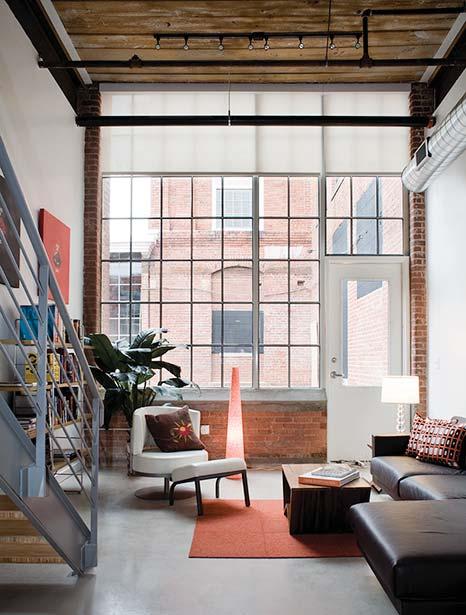 lofts at Golden Belt BY DESIGN 12-ft square wall of windows. Indirect skylighting. Polished concrete floors. Exposed brick and duct work. Solid surface counter tops.