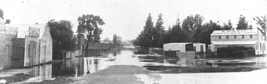 The view along Pultney Street during the 1916 flood. Chas.