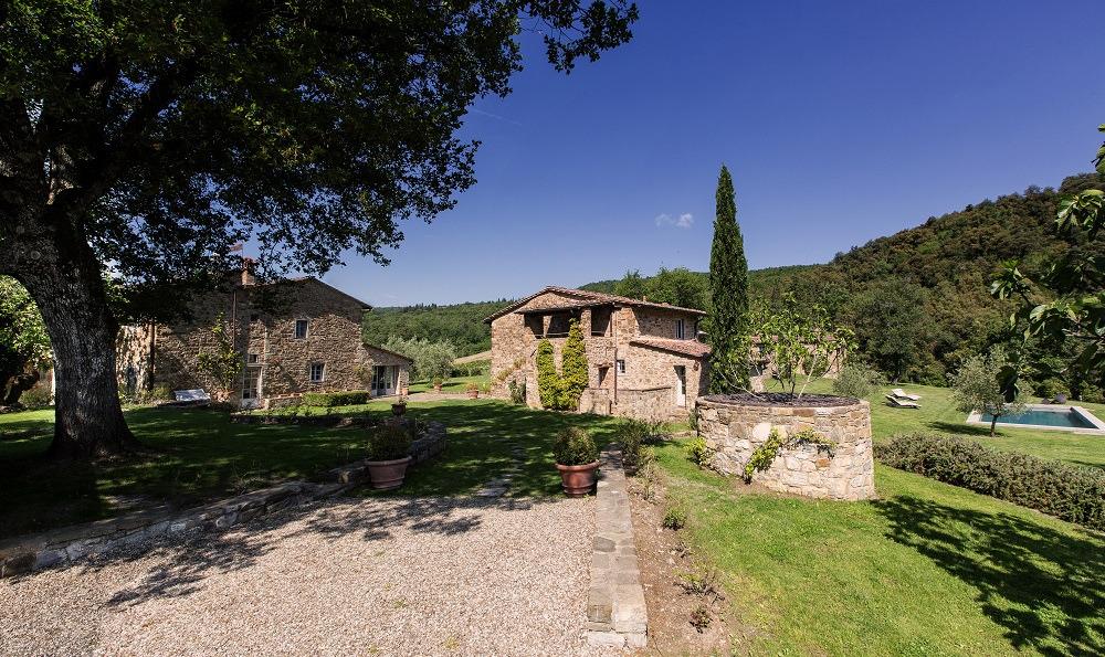 The property SLEEPS 12 IN MAIN VILLA + 4 IN COTTAGE consists of two separate houses in this meadow: the main farm house called La Colonica and the neighbouring Il Cottage.