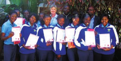 Support Services officer - Dept of Labour, and Vincent Mathebula, Regional Manager of the Dept of Labour. THE Top 5 Grade 4 E learners of Duiwelskloof Primary, front: Rose Malundu and Moloko Modjadji.