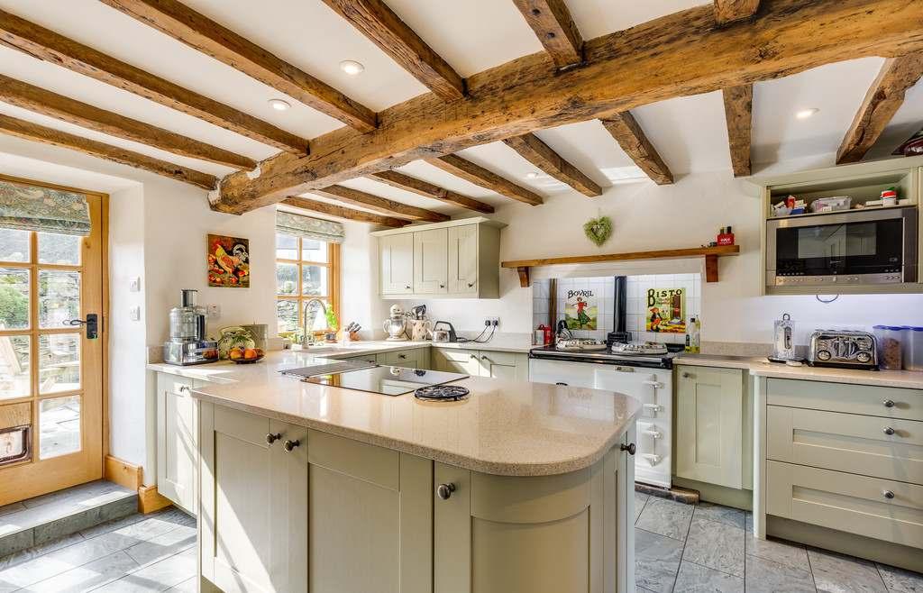 The farmhouse includes a lovely family kitchen, the heart of any home, as well as a delightful lounge, separate sitting room, dining room, cloaks room and a study on the ground floor alongside a