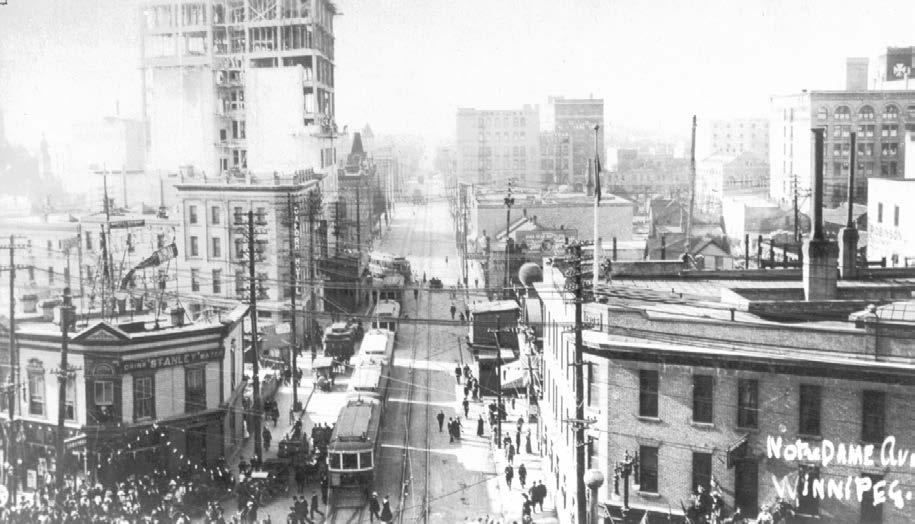 #4 #3 #2 #5 #1 Plate 4 A very busy Notre Dame Avenue, 1911. Pictured are: #1- Queen Hotel, Portage and Notre Dame, built 1879, demolished ca.