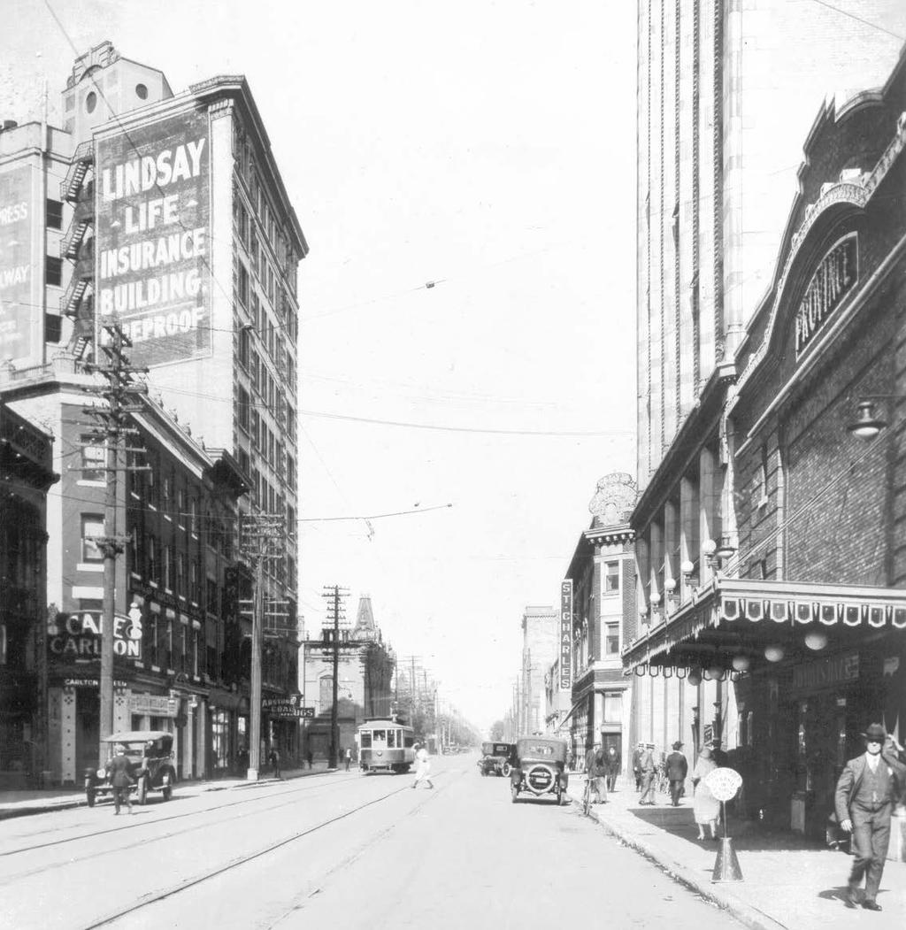 Plate 5 Looking north on Notre Dame Avenue, ca.1927. To the left are the Oxford Hotel, Argyle Block, Lindsay Building and Grace Methodist Church in the background.