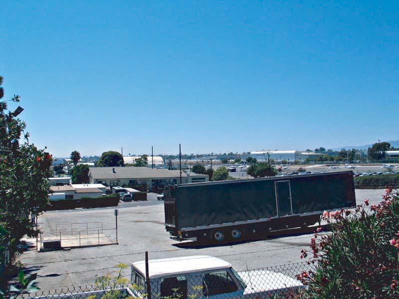 View 19: Looking west from Bundy Drive at airport-related commercial/industrial uses that front Airport Avenue, adjacent to the