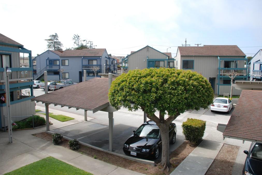 The landscape is exceptional and park like with established Monterey Cypress trees and open grass areas.
