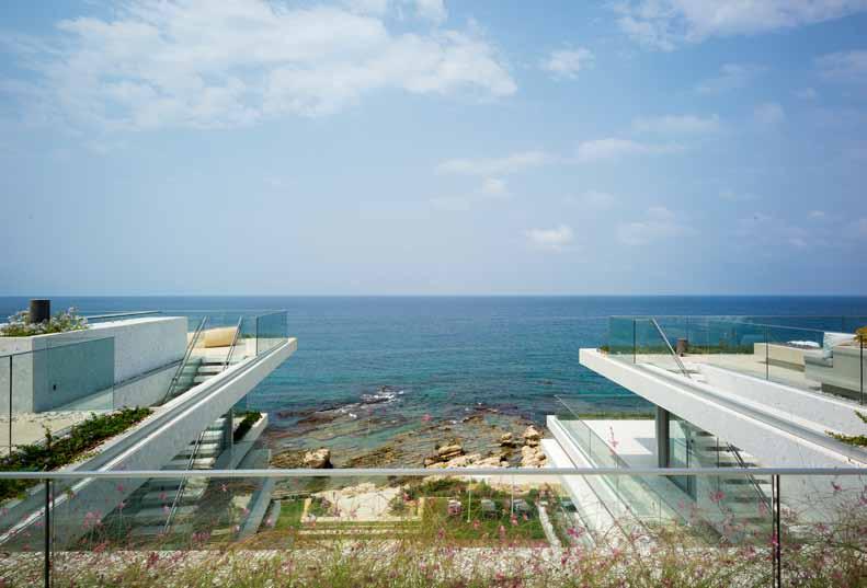 39 PHOTO: NADIM ASFAR A view towards the sea PHOTO: NADIM ASFAR Large windows offer unimpeded views of the sea PHOTO: MARWAN HARMOUCHE An external staircase leads to the roof level The 2000-square