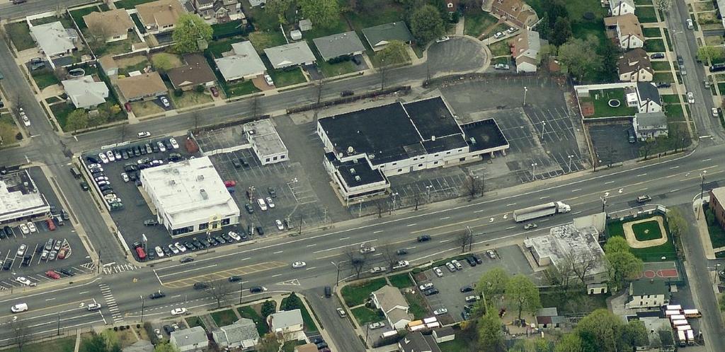 For Lease 22,000± SF Former Auto Dealership on 1.