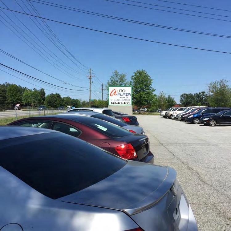 Executive Summary Located on heavily traveled row of auto dealerships on a busy Buford Highway Well-established, used auto dealership business and property for sale/lease Over 14