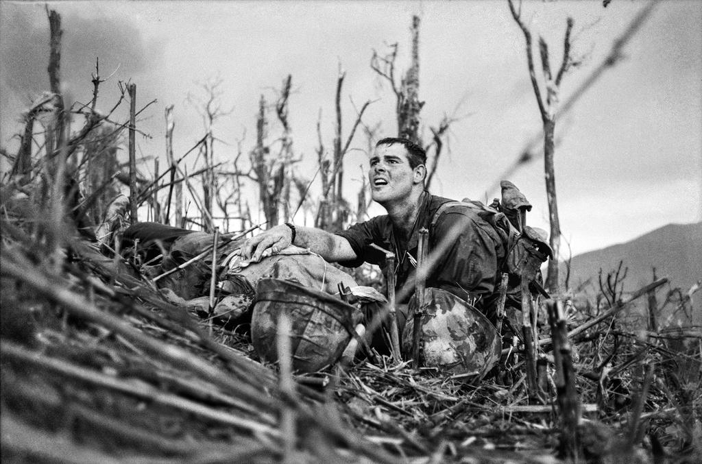 Navy corpsman Vernon Wike, with a dying comrade, near Khe Sanh, South Vietnam, in 1967.