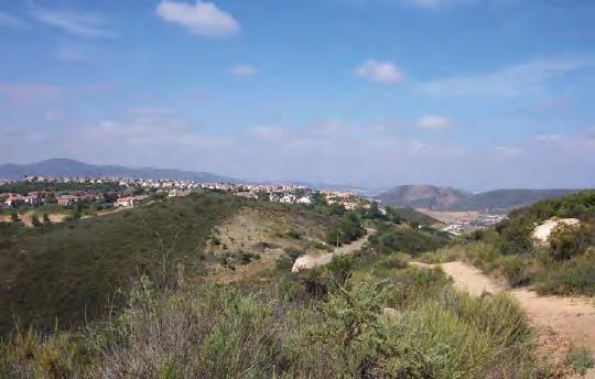 SITE PHOTOS Territorial views southwest towards Emerald Heights Neighborhood in Escondido from ridgeline of project.