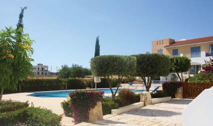 The large residents swimming pool and terrace overlooks landscaped gardens and offers a fabulous Mediterranean