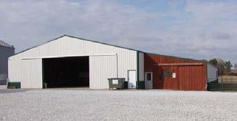 It has a full concrete floor, is fully insulated, and lined with painted metal. The clear-wall height is 17.