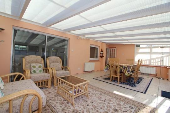 Conservatory 25'4 x 13 upvc double glazed construction on low height walls with a