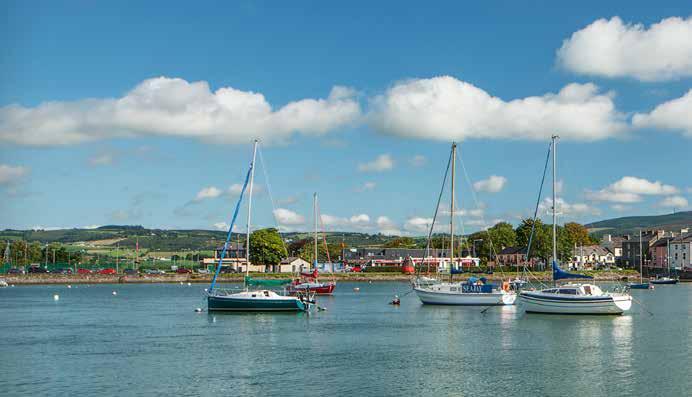 LOCATION, LOCATION, LOCATION Dungarvan is a thriving seaside town nestled beneath the beautiful Comeragh mountains of County Waterford.