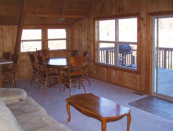 Lakefront A-Frame 2 bedrooms, 2 baths sleeps 8 This charming two story hideaway is fully equipped with a complete kitchen and a large deck with gas grill overlooking the lake and close to the