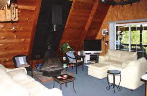 The loft has two queen beds; the main level has full bath, wood burning fireplace and a king bedroom; the lower level has a king bed and a queen futon with a full bath.