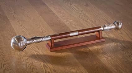 THE UNIVERSITY MACE Maces were originally medieval weapons carried by bodyguards to kings and sergeants-atarms.