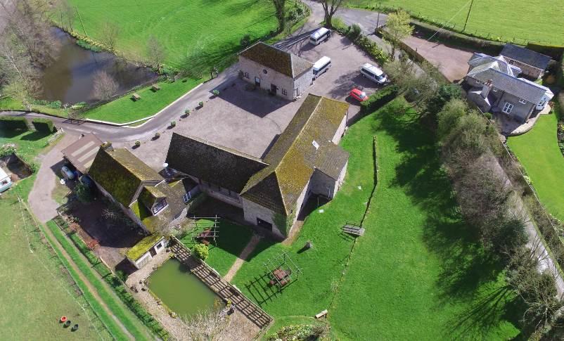 venue business property comprising spacious L-shaped converted barn,