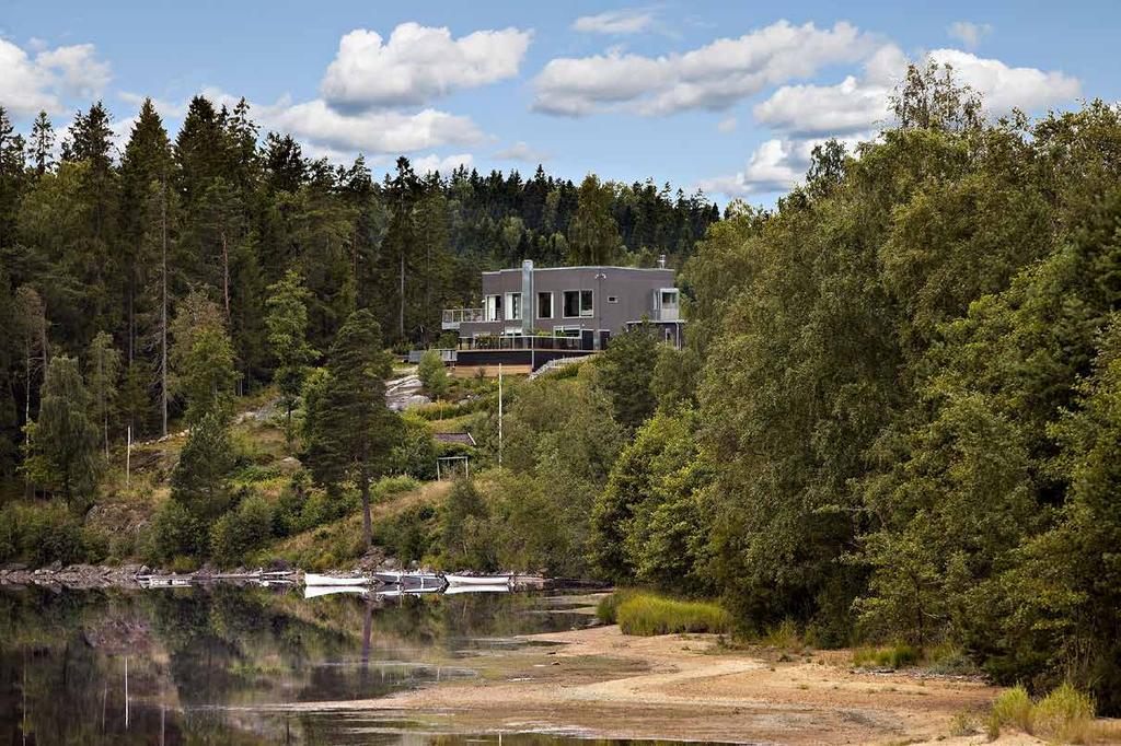 House Hindås, Gothenburg, Sweden Nestled between Lake and Forest The house is nestled between the coniferous forest and the lake.