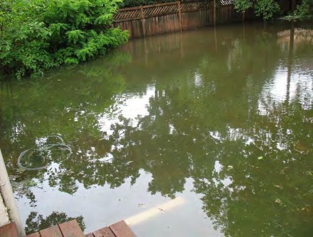 4 2417 Woodbridge Road Forbes Flooding in backyard area of Woodbridge and Lafayette Roads.