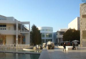 of five galleries arranged around a long courtyard fountain The skin of all of the buildings is composed of 30-inch square panels, made of aluminium painted white, Meier's signature Even the Italian