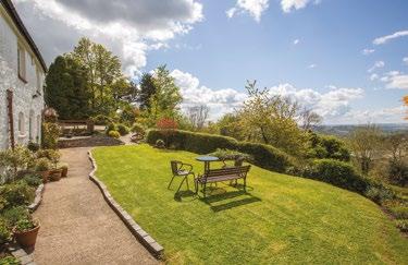The Hermitage WEST MALVERN WORCESTERSHIRE Westerly views over Herefordshire to Wales in the distance and bordering directly onto the Malvern Hills Reception Hall Drawing room Sitting room Family room