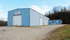There is apx. 10,956+/- sq.ft. in total. The large warehouse offers 5,540+/- sq.ft. & includes 3 large doors, 7.5 ton overhead crane, 4 Jib crane beams and a finished office.