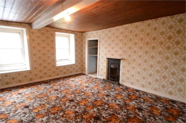 EN-SUITE 4' x 7' 5" Hand basin set within storage unit. Walk in bath. DINING ROOM/LOUNGE 15' x 12' 1" Fireplace.
