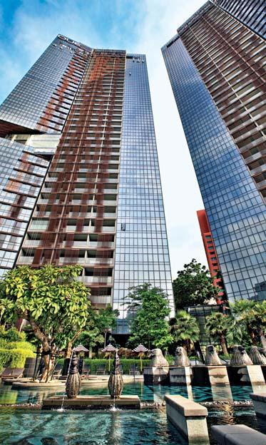 Collection proves to be a lure for homebuyers and investors Since OUE Twin Peaks was launched last April with a deferred payment scheme, all except one of the 462 units have been sold BY CECILIA CHOW