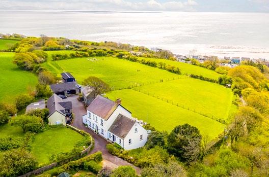 7 acres (stms) EPC Main House = F Situation Furzewood Farm & Cottages enjoys an elevated position with superb sea views overlooking the ever popular coastal village of Amroth in the famous