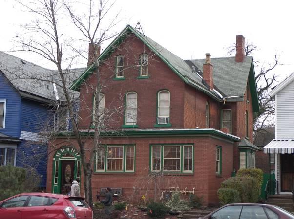 1878 Two-and-a-half story brick Italianate style house. The earliest known occupant was the contractor Peter Hickler, who may have built the building.