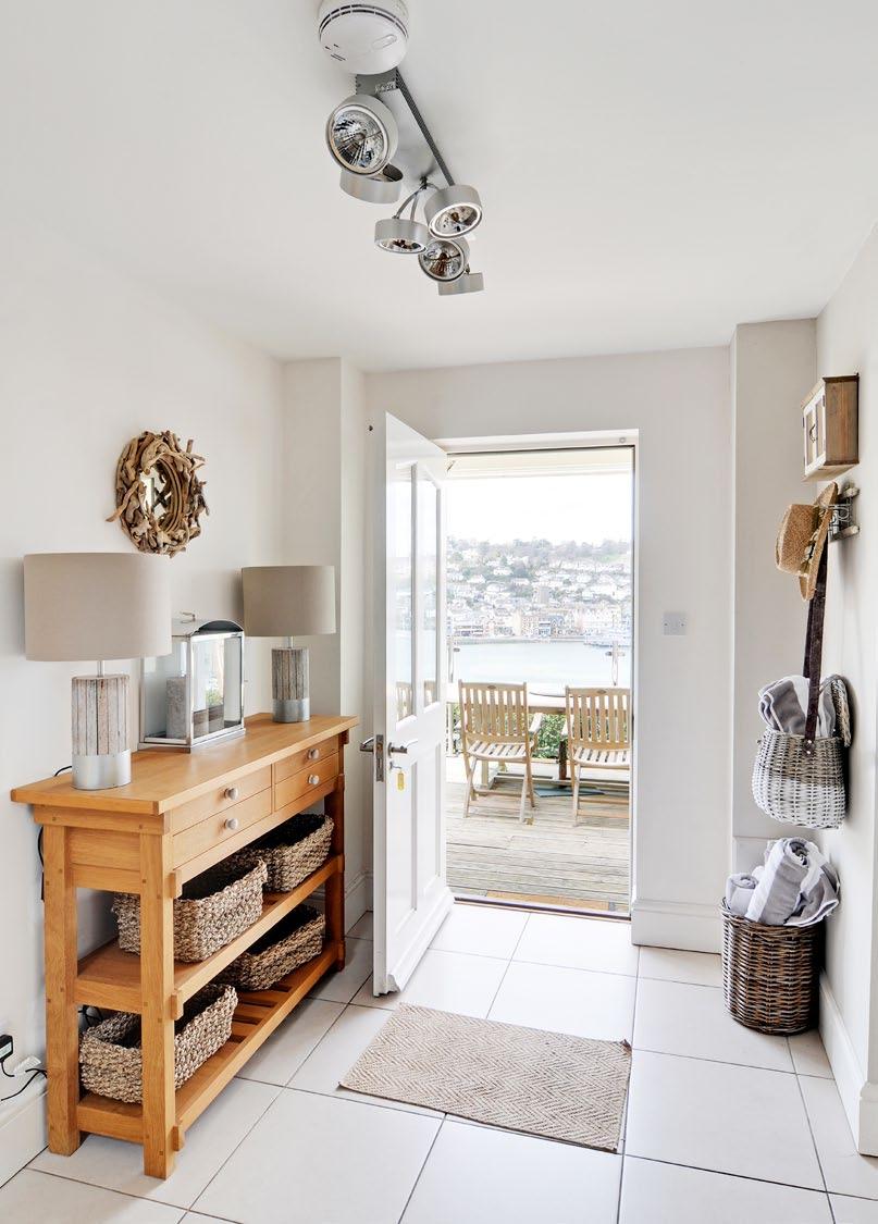 further bedrooms Spectacular panoramic views of the River Dart Garden Summer house Log store Garage Store room EPC Rating F On the ground floor is the spacious kitchen/ dining room, with Trembath
