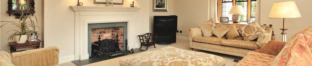 Leading from this room is a family room with its own fireplace and views of the rear garden.