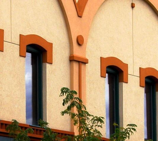 combination of these materials. Stucco (EIFS) is only permitted when it is sufficiently detailed to provide interest and surface variation.