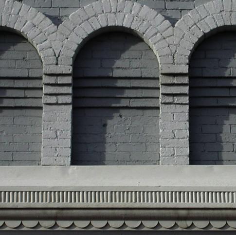 g., an eave, cornice, and/or parapet line) that complement and balance one another. b. A building s facade shall emphasize each floor in the external design.