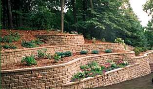 Retaining walls shall blend with the natural features of the surrounding area by satisfying the following provisions: a. Walls shall be constructed of rock where practical.