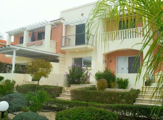 Master bedroom has a balcony. PEYIA 2 B/R townhouse full 115,000 This 2 bedroom townhouse offers lovely views to the pool and mature manicured gardens and also to the sea. The property is on 2 levels.