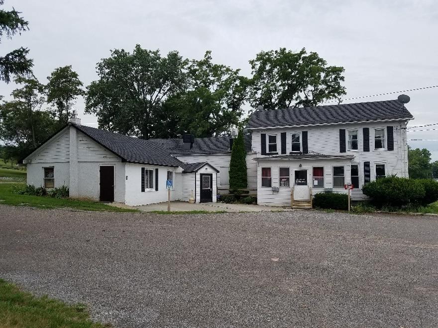 Also included is a one-bedroom apartment, located above the restaurant. Property includes municipal water and sewer, as well as a 24'x18' garage.