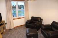 floor flat with garden, situated a pleasant short walk from the