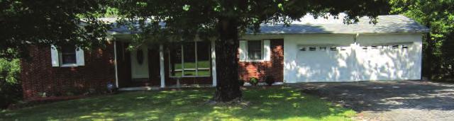Room Large Utility Room Single Car Attached Carport Covered Front and Rear Porches $70,000 Call Tina Raymer-Hall
