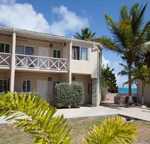 LORD NELSON GROUP 3 This two story building made from Antiguan Green Stone is comprised of ten apartments each with two private bedrooms and a shared bathroom in the apartment.